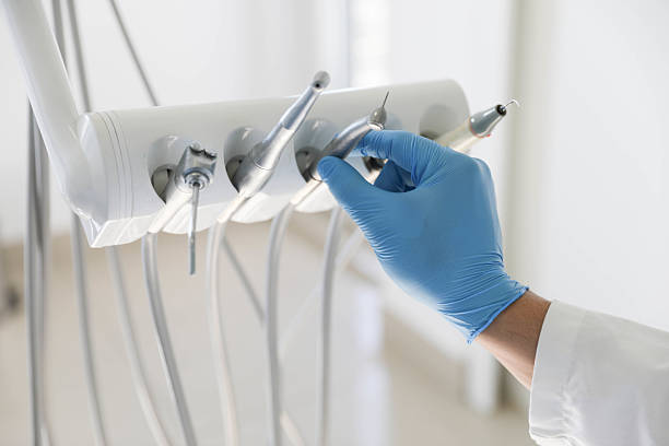 Professional Tooth Extraction technician working in Pana, IL